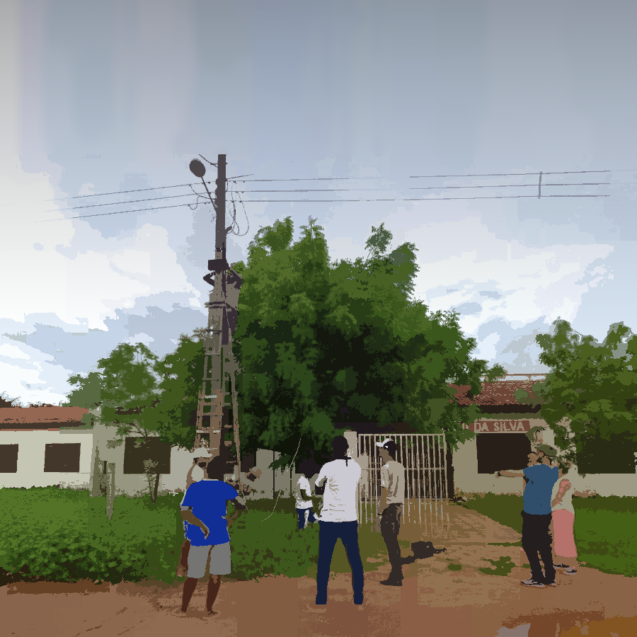 podemos ver um grupo de pessoas reunidas em um ambiente externo para a implementação de uma nodo da rede.